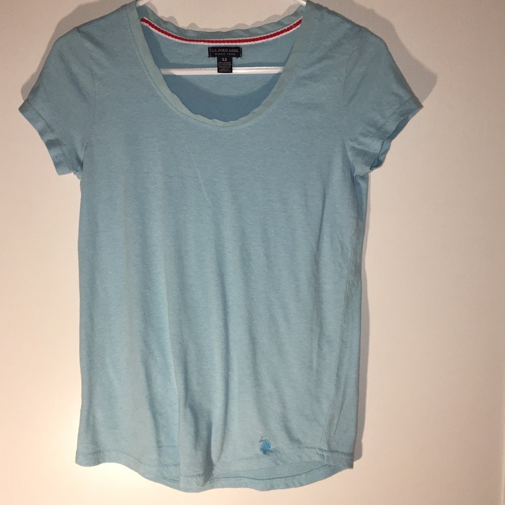 Blue polo shirt .